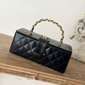 CHANEL VINTAGE COSMETIC BAG 22 IN BLACK SHINY CALFSKIN GOLD HARDWARE