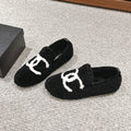 CHANEL LOAFERS IN BLACK FLEECE WITH WHITE LOGO