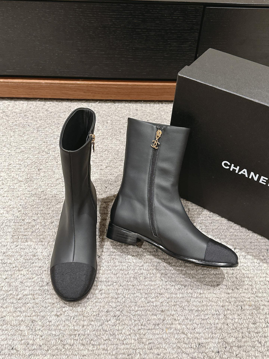 CHANEL SHORT BOOTS IN BLACK LAMBSKIN AND FABRIC
