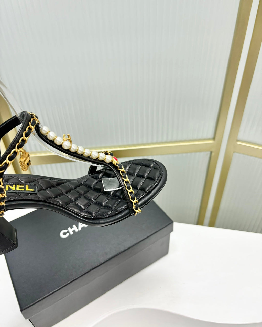 CHANEL HIGH HEELS PEARL CHAIN IN BLACK COWHIDE
