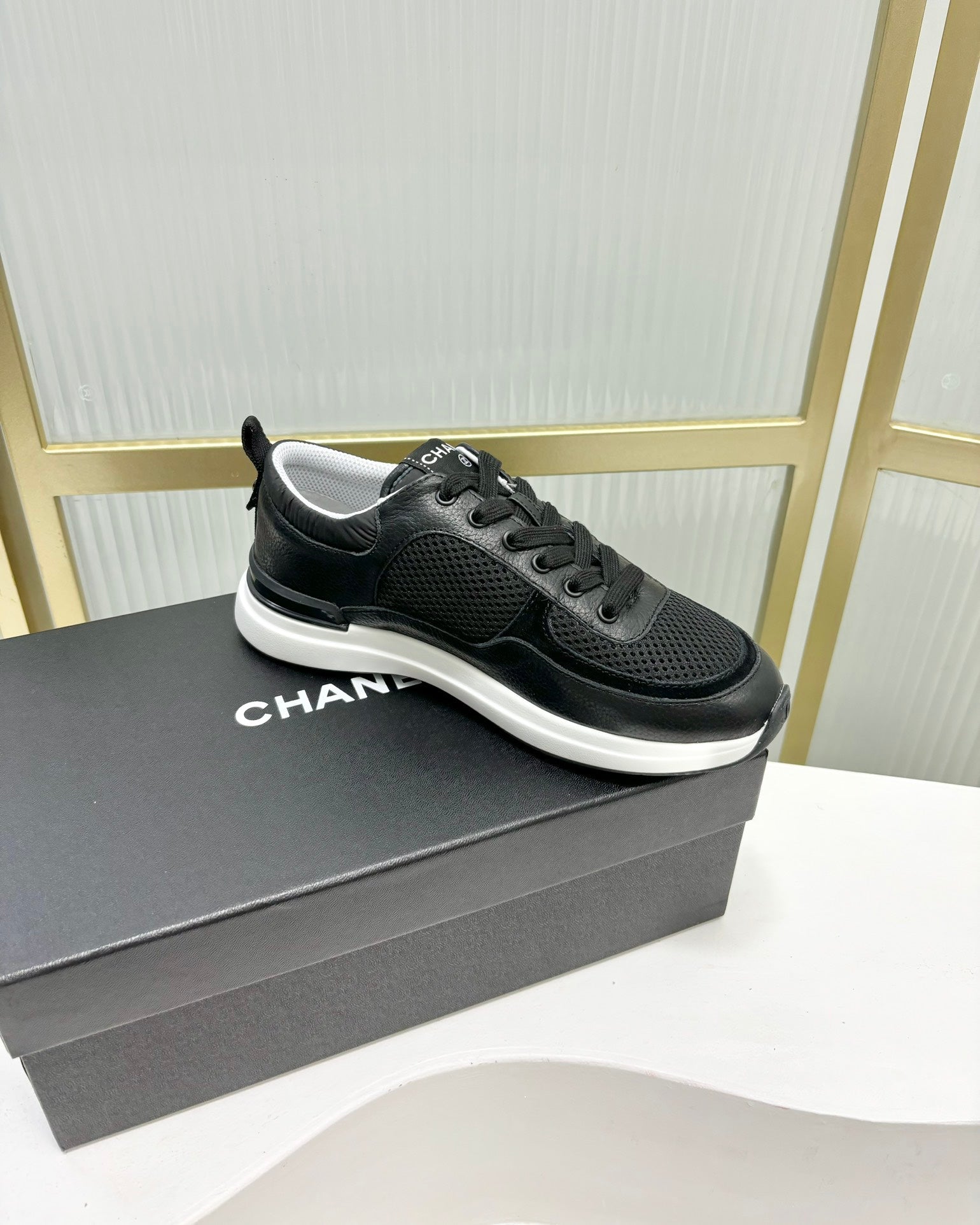 CHANEL SNEAKER IN BLACK SUEDE WITH WHITE LOGO