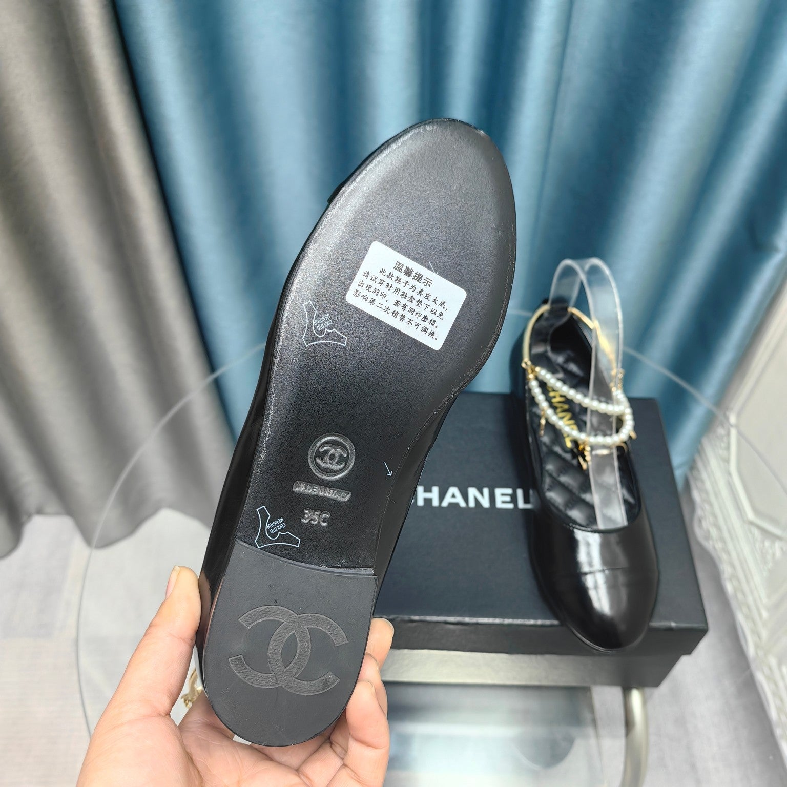 CHANEL MARY JANE WITH PEARL STRAP IN GLOSSY BLACK LAMBSKIN
