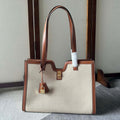 CELINE CABAS 37 IN WHITE CANVAS AND BRONZE BROWN CALFSKIN TRIM GOLD LOCK