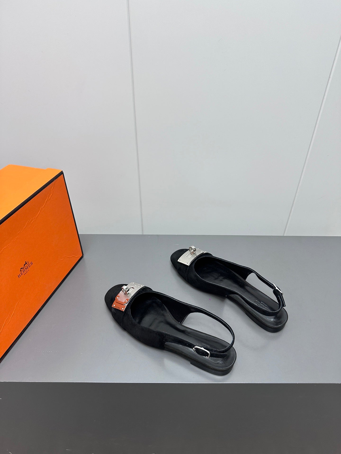 HERMES INNOCENTE SLINGBACK IN BLACK SUEDE