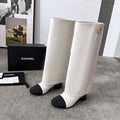 CHANEL 25S HIGH BOOTS 55MM IN IVORY BLACK CALFSKIN AND CANVAS GOLD HARDWARE