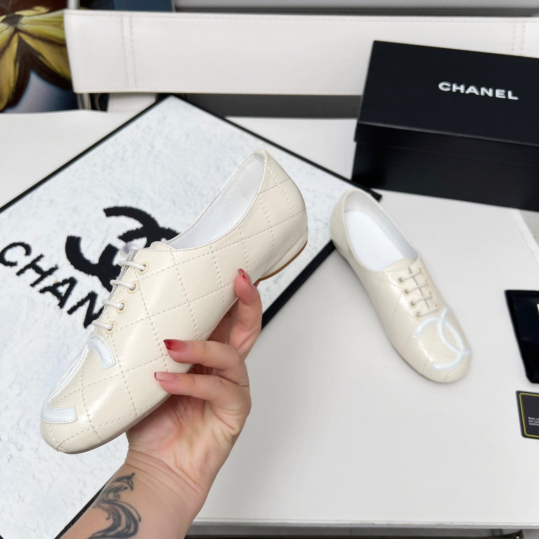 CHANEL 25S DANCE SHOES WITH PRINTED LOGO IN WHITE CALFSKIN