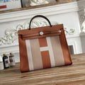 HERMES ZIP CABINE 31 BAG IN BRONZE BROWN MIX WHITE CANVAS AND CALFSKIN