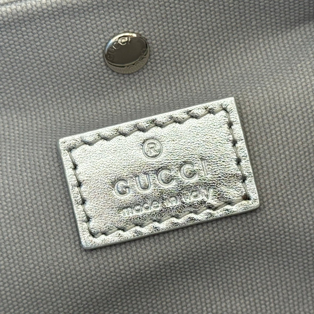 GUCCI 26S  EMBLEM BUCKET BAG 19 IN BEIGE AND SILVER CANVAS