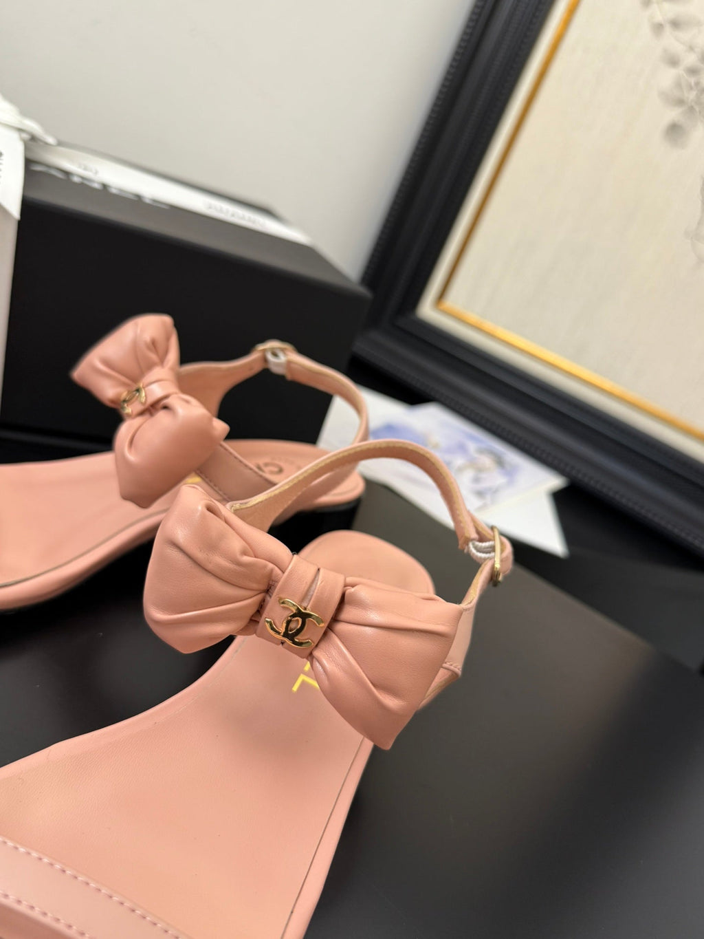 CHANEL FLAT SANDALS IN PEACHY PINK CALFSKIN WITH BOW