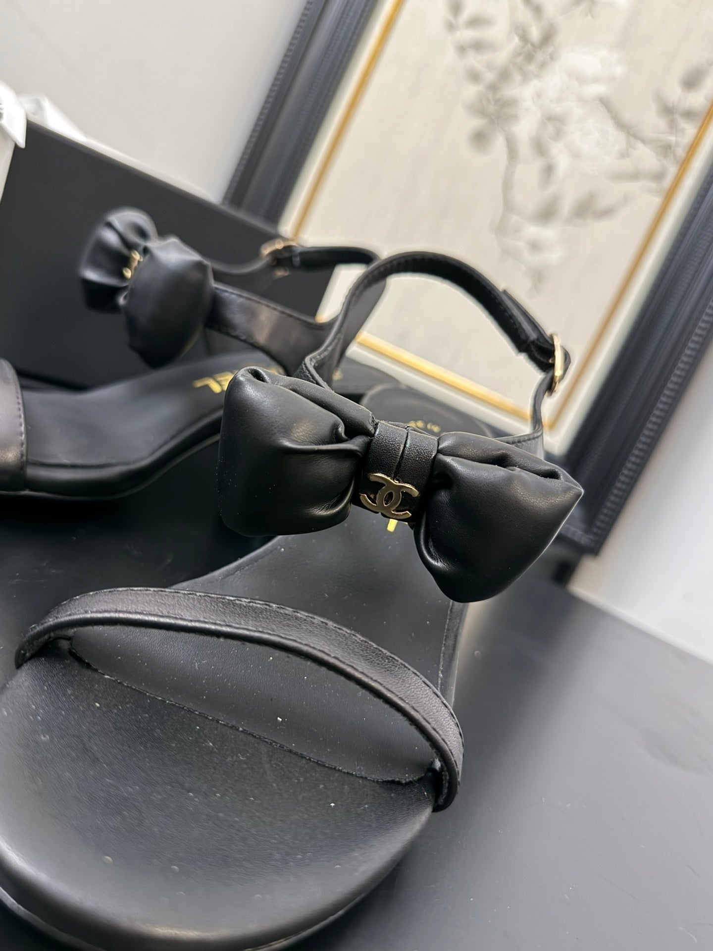 CHANEL MID HEEL SANDALS IN BLACK CALFSKIN WITH BOW