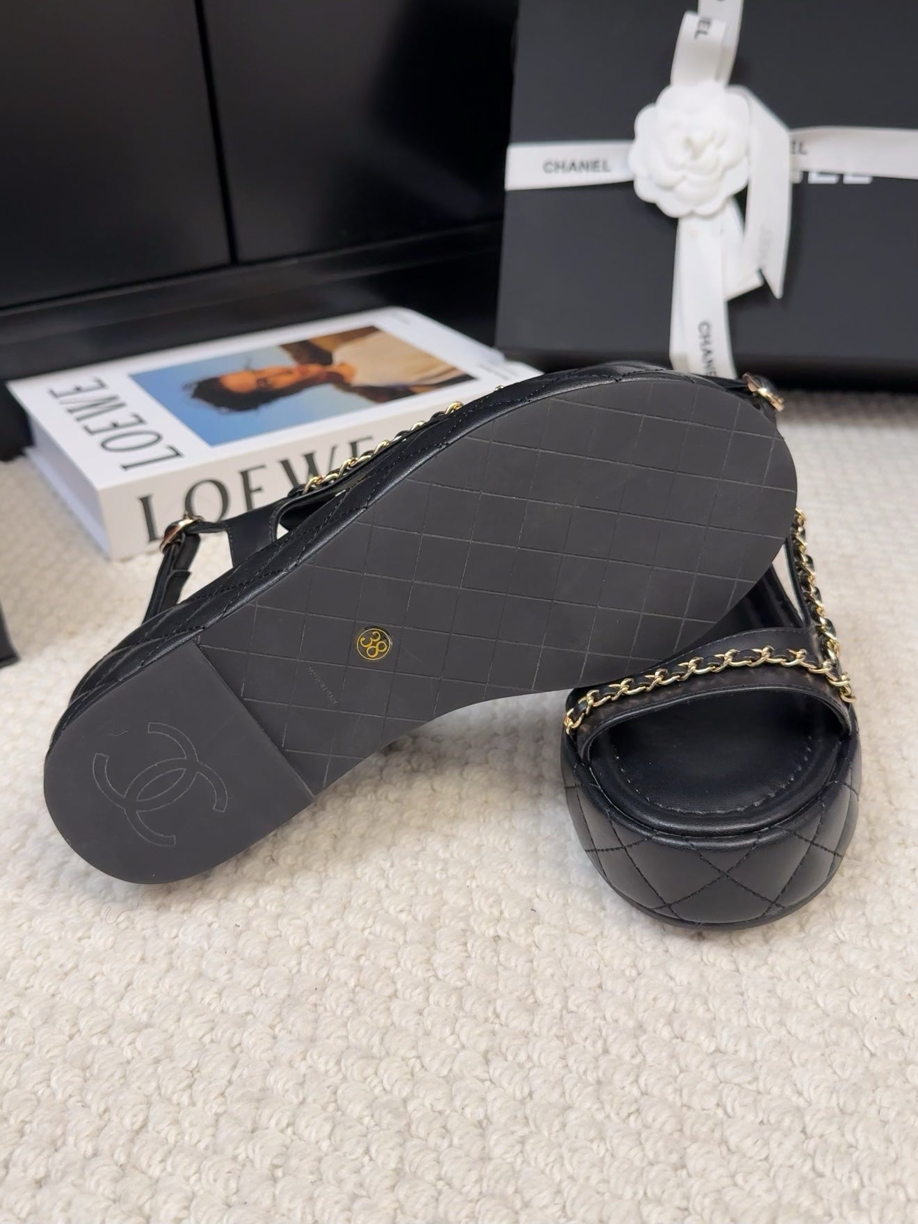 CHANEL THICK-SOLED SANDALS 55 MM IN BLACK CALFSKIN