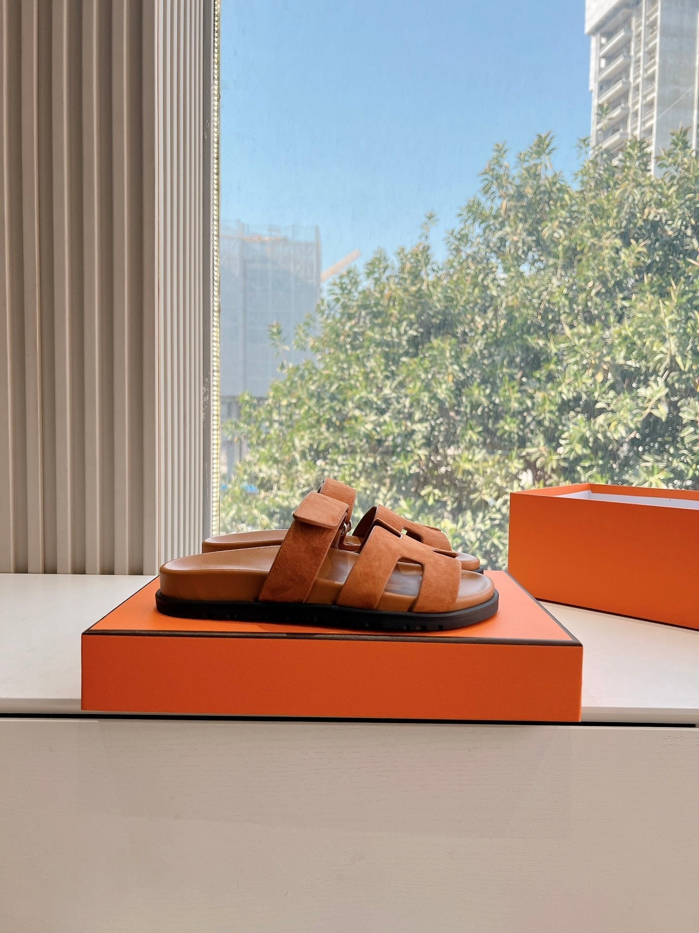 HERMES CHYPRE SANDAL IN VIVID ORANGE SUEDE