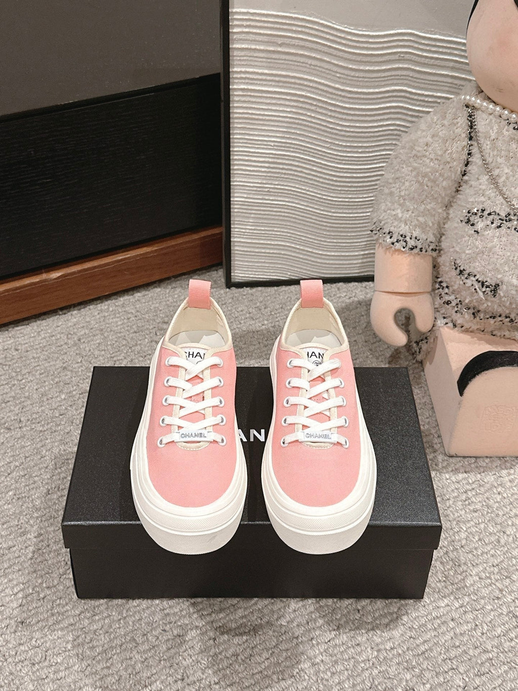 CHANEL LACE-UP SNEAKERS IN PASTEL PINK CANVAS