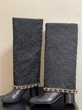CHANEL FLORAL BOOTS 60MM IN BLACK CALFSKIN WITH GOLD CHAIN