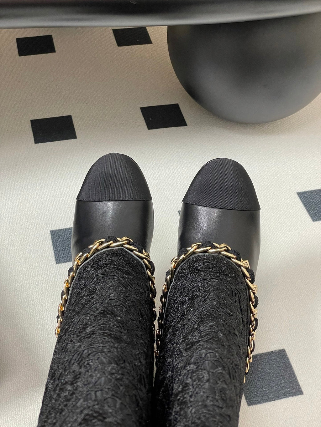CHANEL FLORAL BOOTS 60MM IN BLACK CALFSKIN WITH GOLD CHAIN
