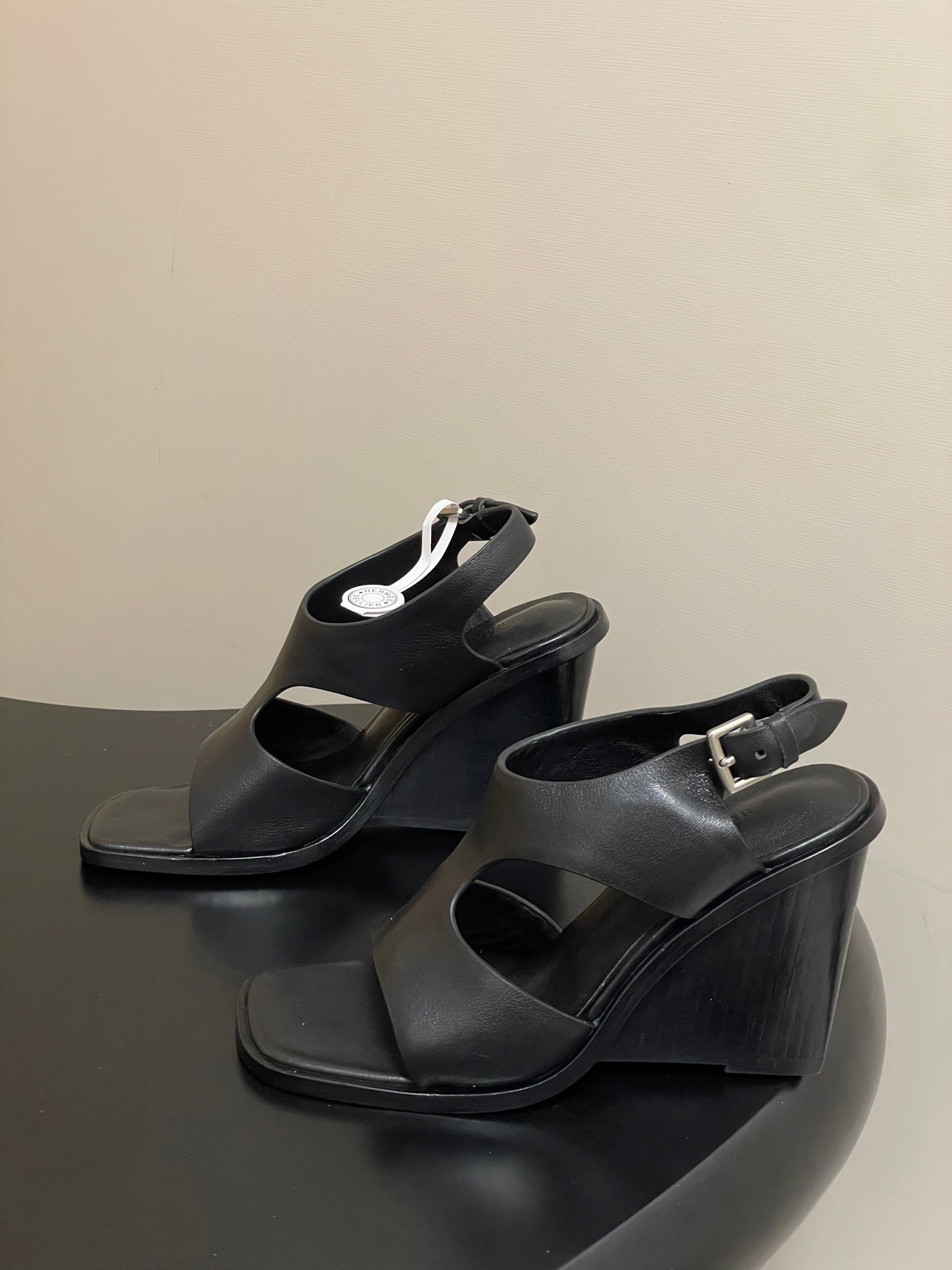 HERMES 25S KALYA WEDGE SANDAL 100 MM IN BLACK LAMBSKIN