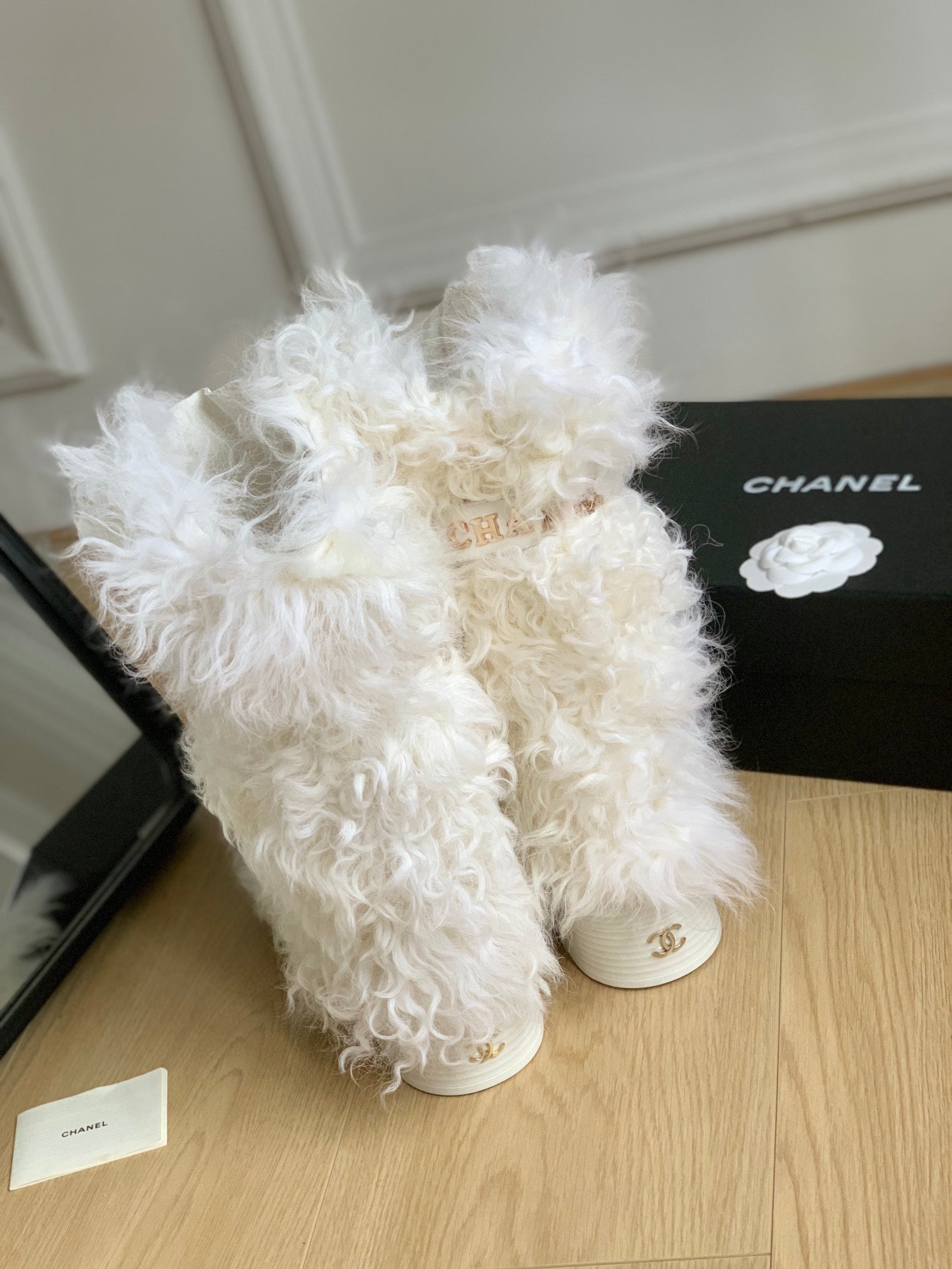 CHANEL ANKLE HIGH BOOTS IN WHITE MIX BLACK WOOL FUR