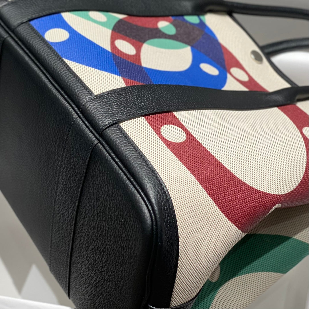 HERMES GARDEN PARTY 36 IN MULTICOLOR TOILE H CANVAS BLACK CALFSKIN OVERLAPPING POLKA RINGS PRINT