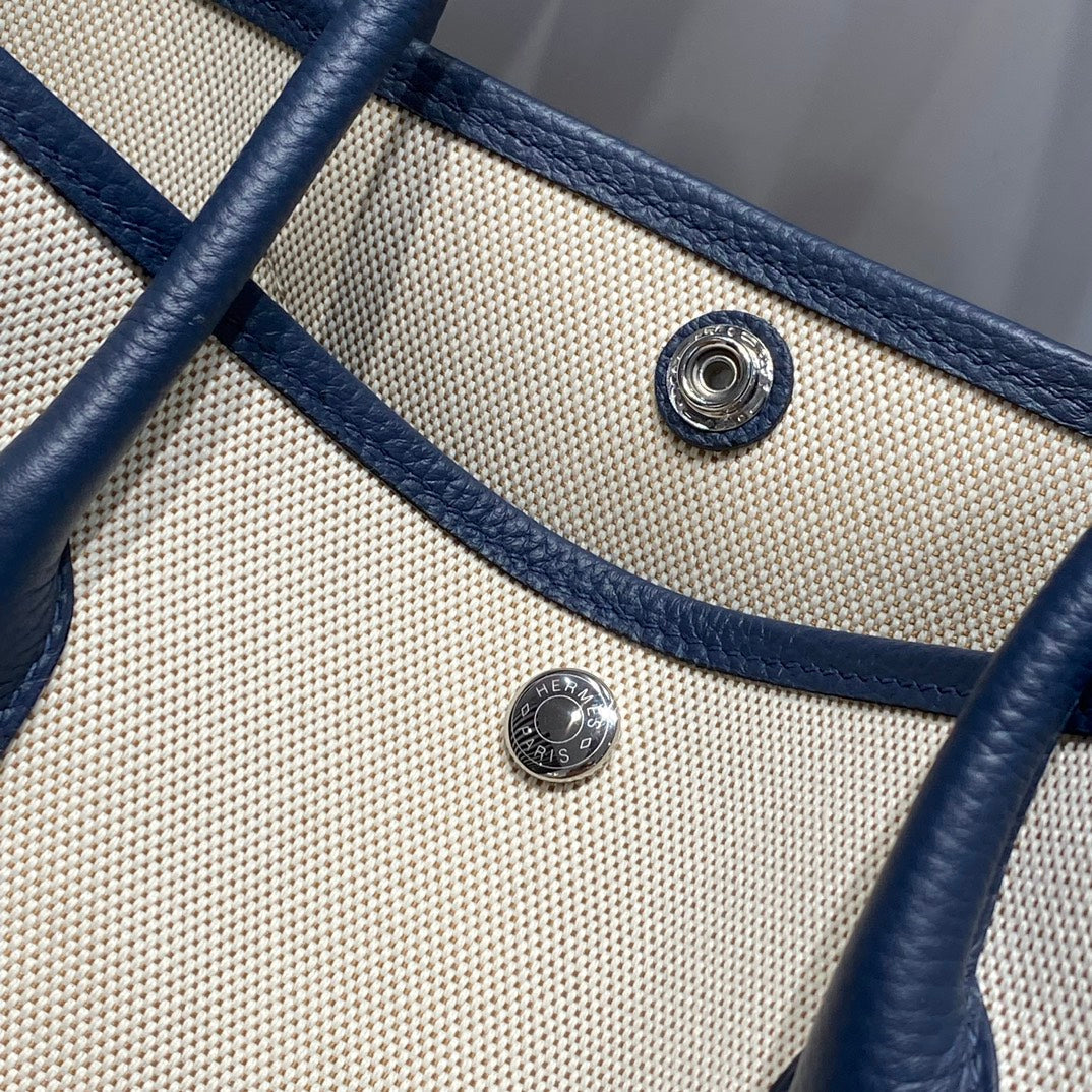 HERMES GARDEN PARTY 36 IN NAVY CREAM TOILE H CANVAS BLUE MARINE CALFSKIN ABSTRACT BEAR FACE PRINT