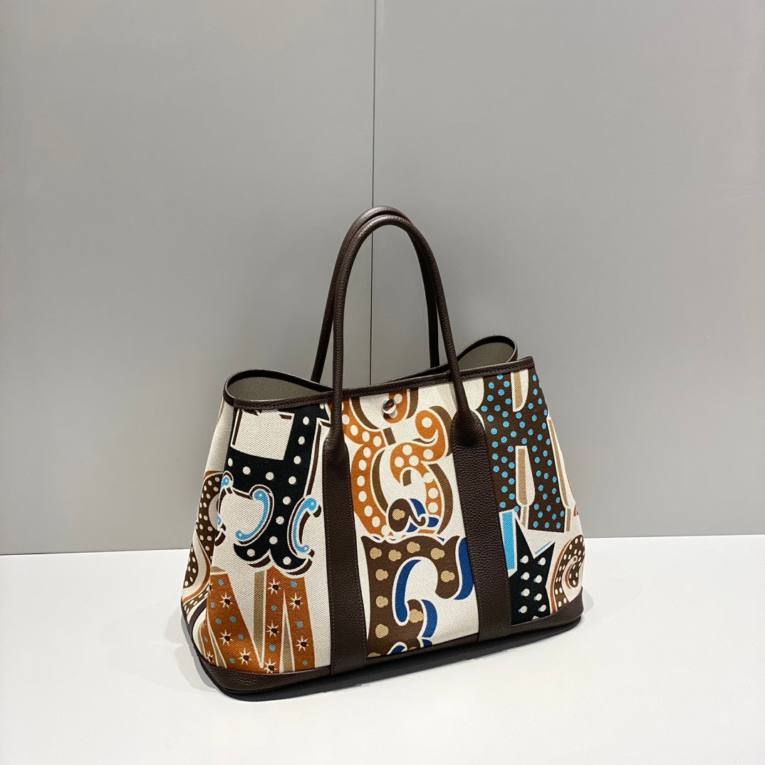 HERMES GARDEN PARTY 36 IN MULTICOLOR TOILE H CANVAS DARK BROWN CALFSKIN ABSTRACT GRAPHIC PRINT