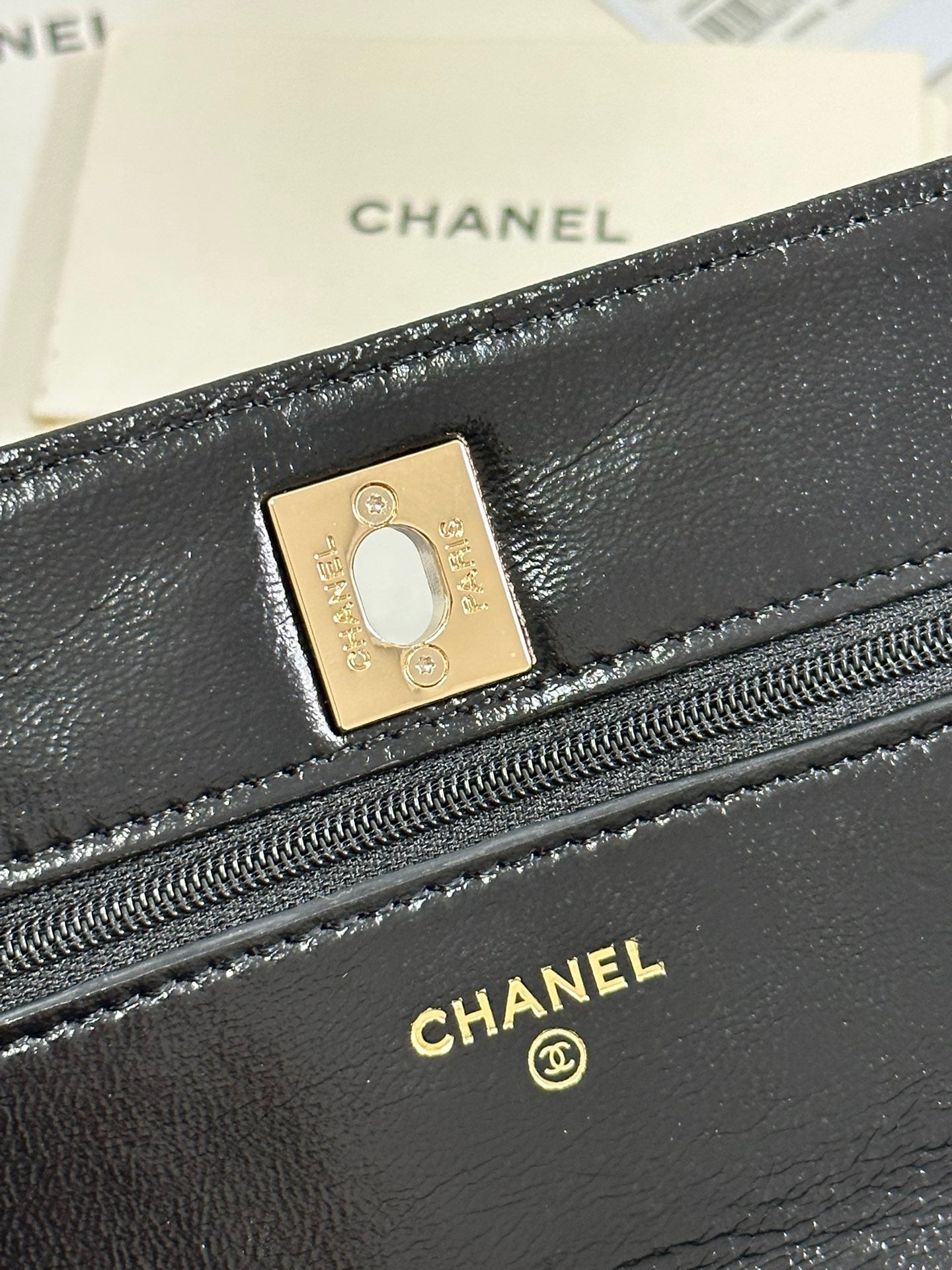 CHANEL PEARL HANDLE FLAP BAG 18 IN BLACK SHINY LAMBSKIN