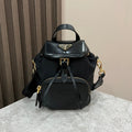 PRADA MINI BACKPACK 18 IN BLACK RE-NYLON AND GLOSSY CALFSKIN GOLD HARDWARE