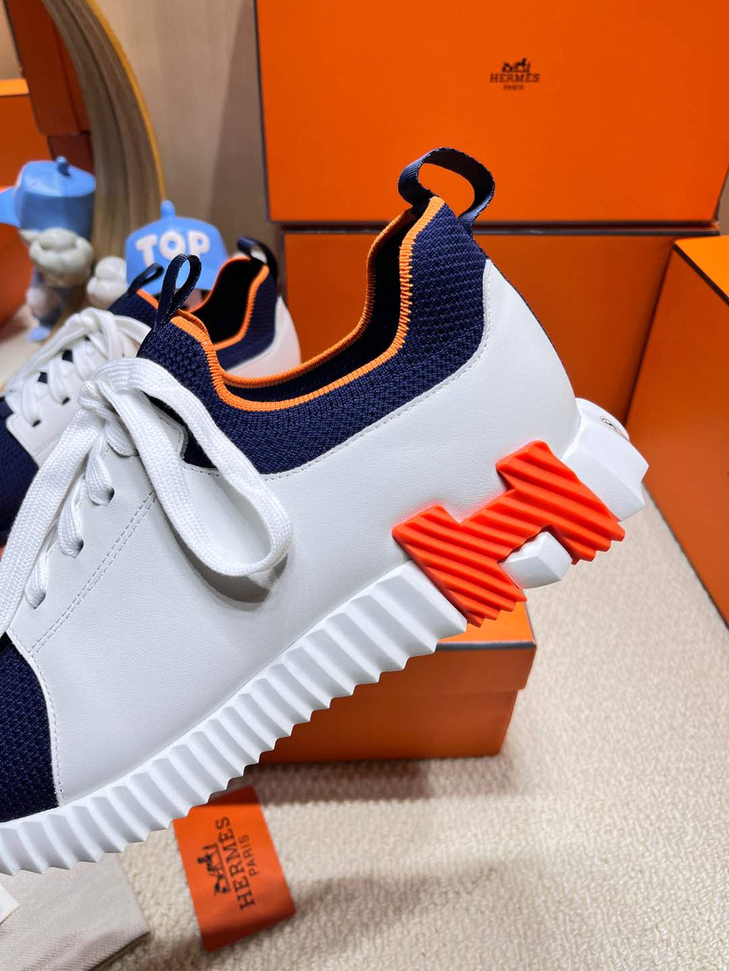 HERMES DEPART SLIP-ON SNEAKER IN NAVY BLUE KNIT AND WHITE CALFSKIN