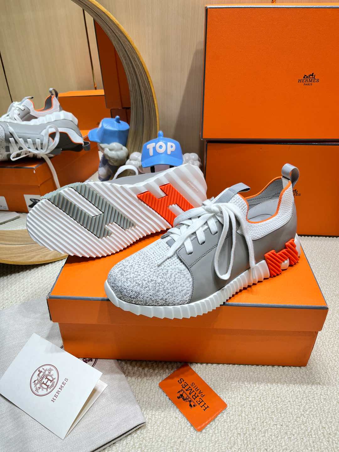 HERMES DEPART SLIP-ON SNEAKER IN WHITE MIX MOUSE GRAY KNIT AND CALFSKIN