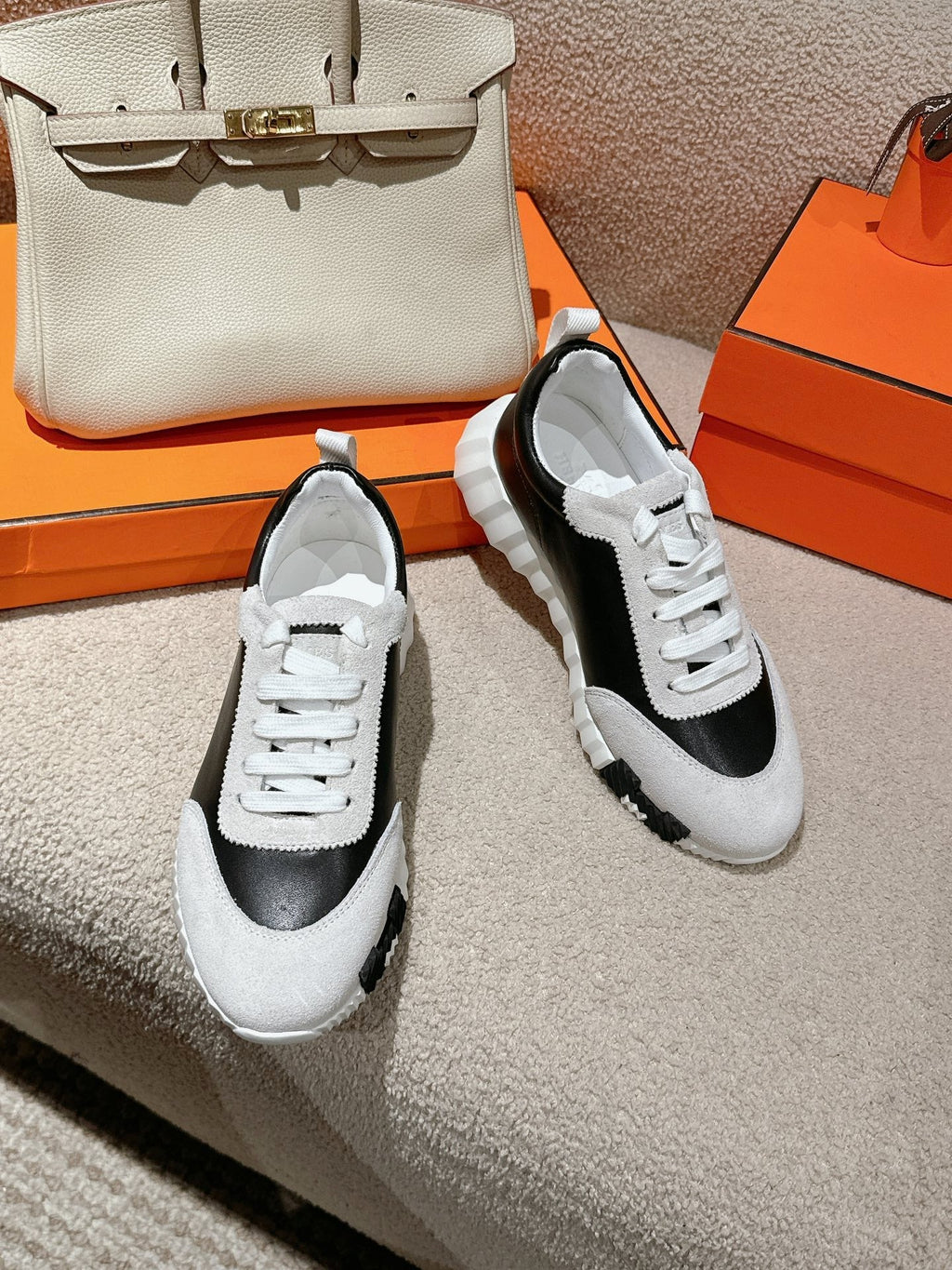 HERMES MAINLAND SNEAKER IN PALE GRAY SUEDE AND BLACK CALFSKIN