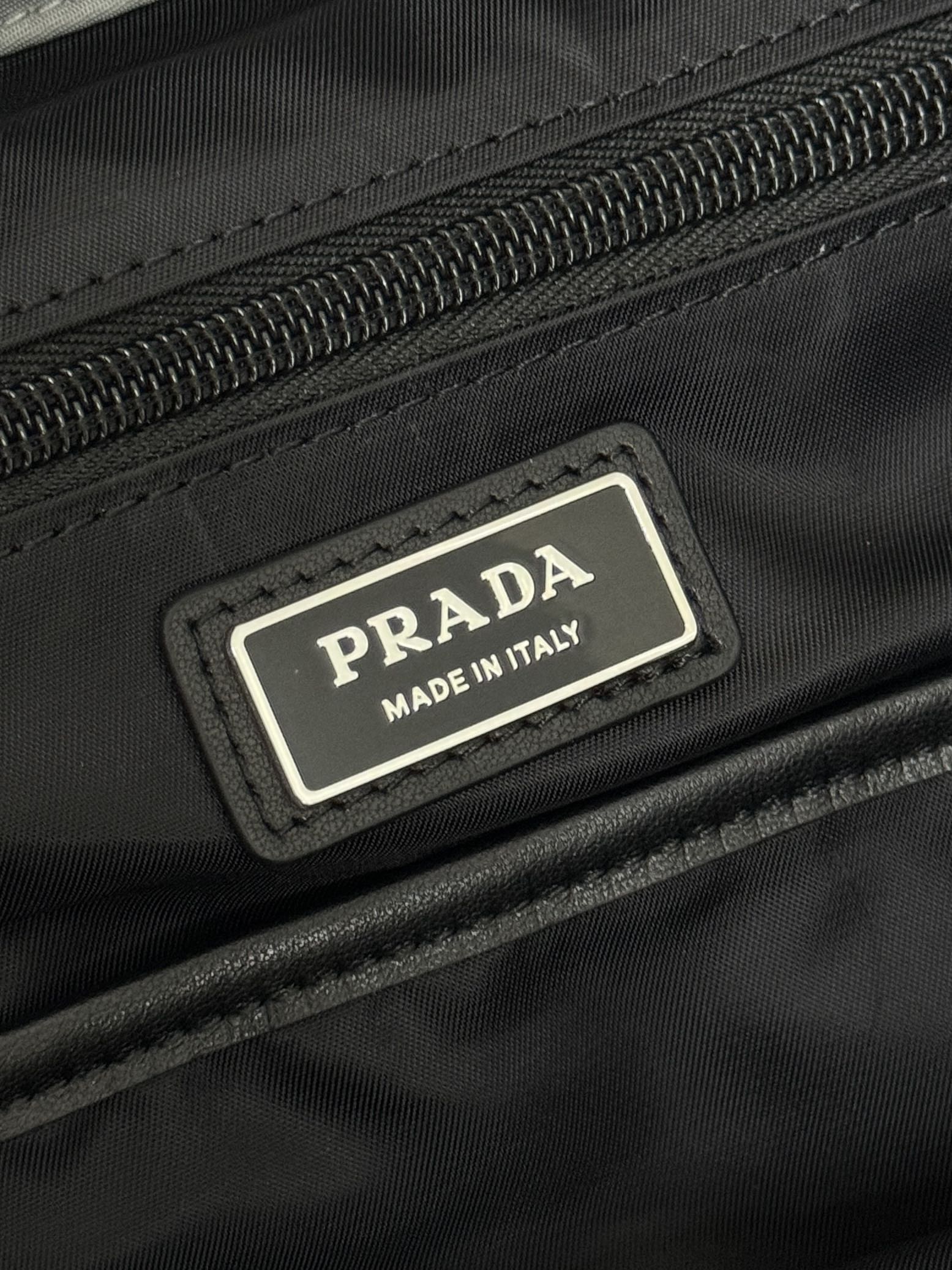 PRADA TRIANGLE LOGO BACKPACK 42 IN RHINO GRAY RE-NYLON
