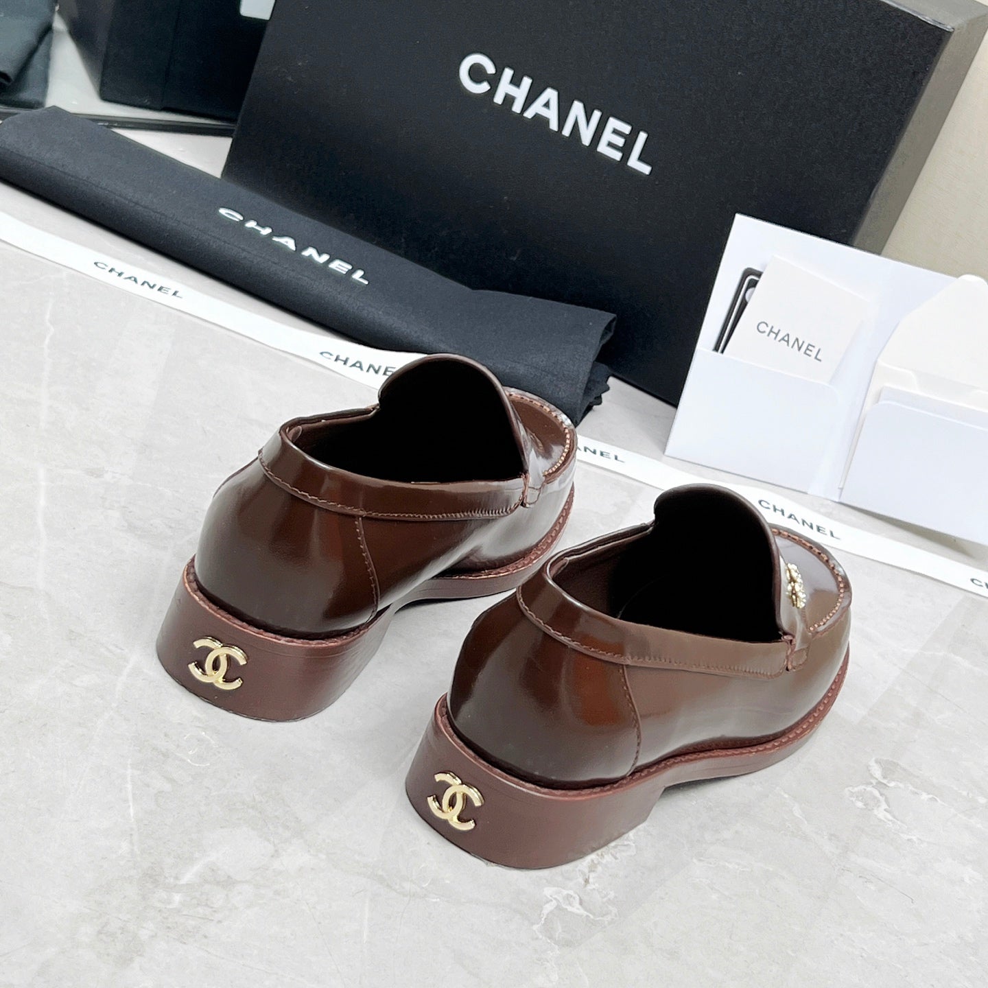 CHANEL MOASINS IN BROWN CALFSKIN