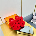 HERMES CHYPRE SANDAL IN CHERRY RED SHEARLING
