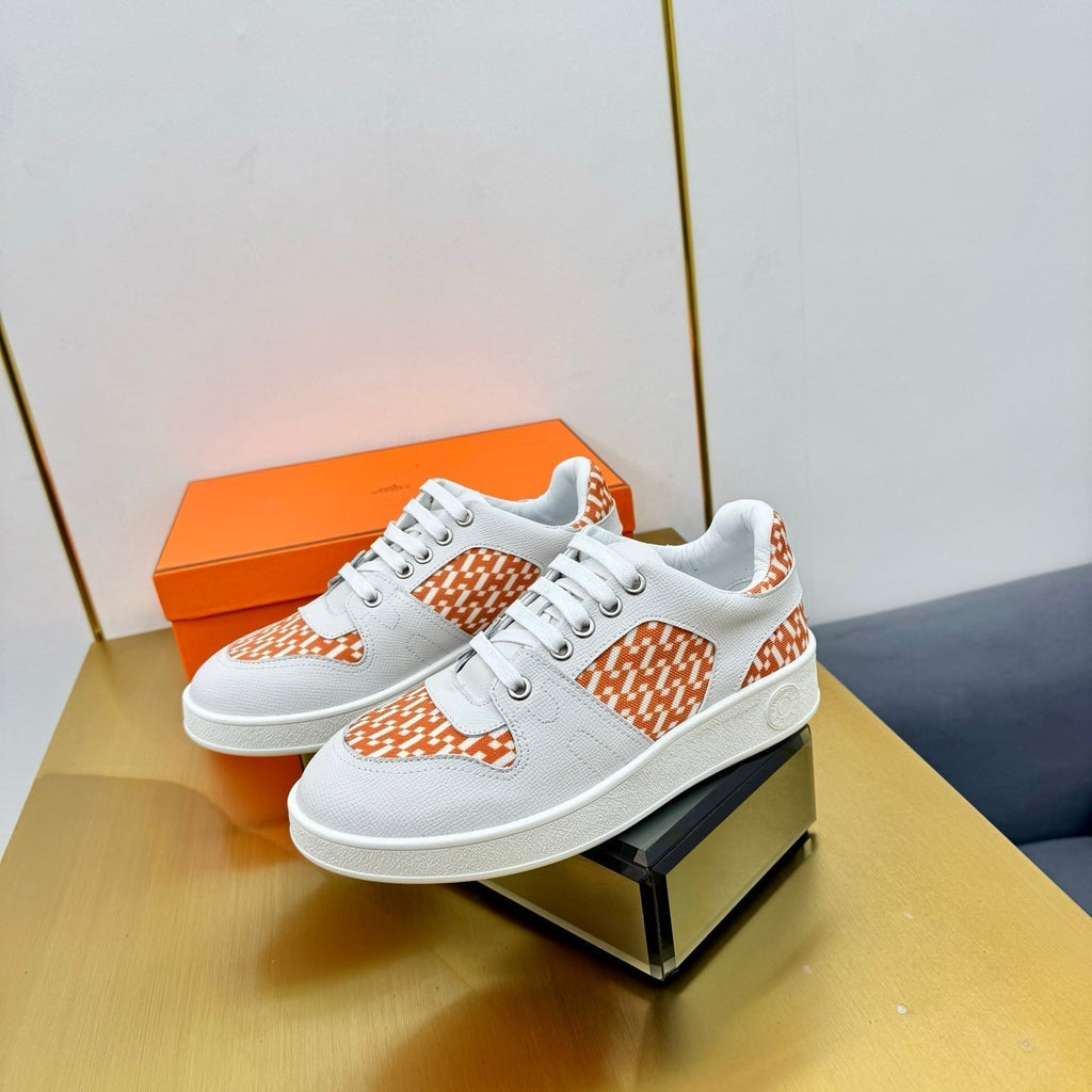 HERMES FREE SNEAKER IN WHITE CALFSKIN AND "H EN BIAIS" ORANGE CANVAS