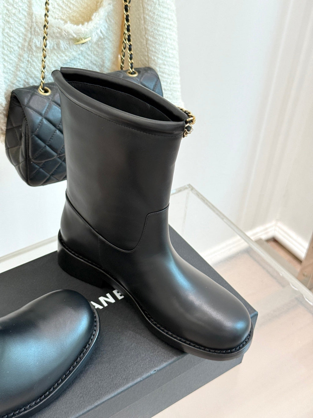 CHANEL SHORT BOOTS IN BLACK CALFSKIN