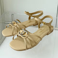 CHANEL FLAT SANDALS 1 CM IN FLAX YELLOW LAMBSKIN