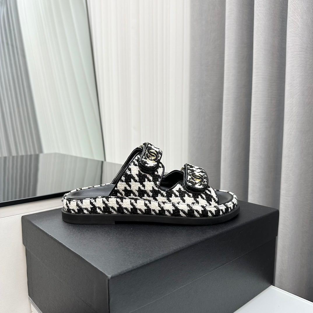 CHANEL dad sandals black white mules