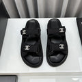 CHANEL dad sandals black textile mules