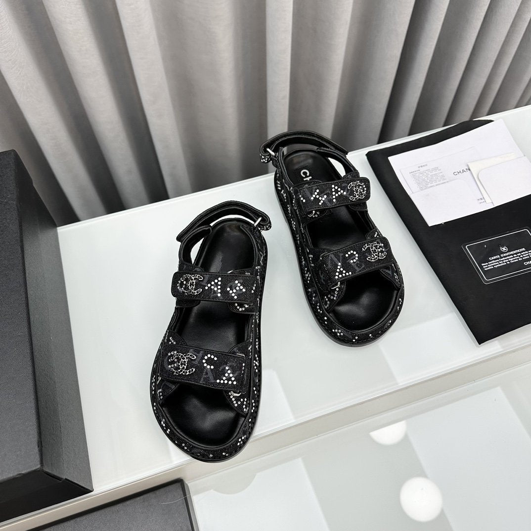 CHANEL dad sandals black denim mules