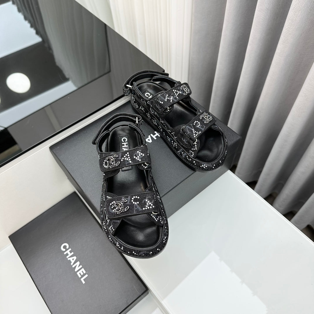 CHANEL dad sandals black denim mules
