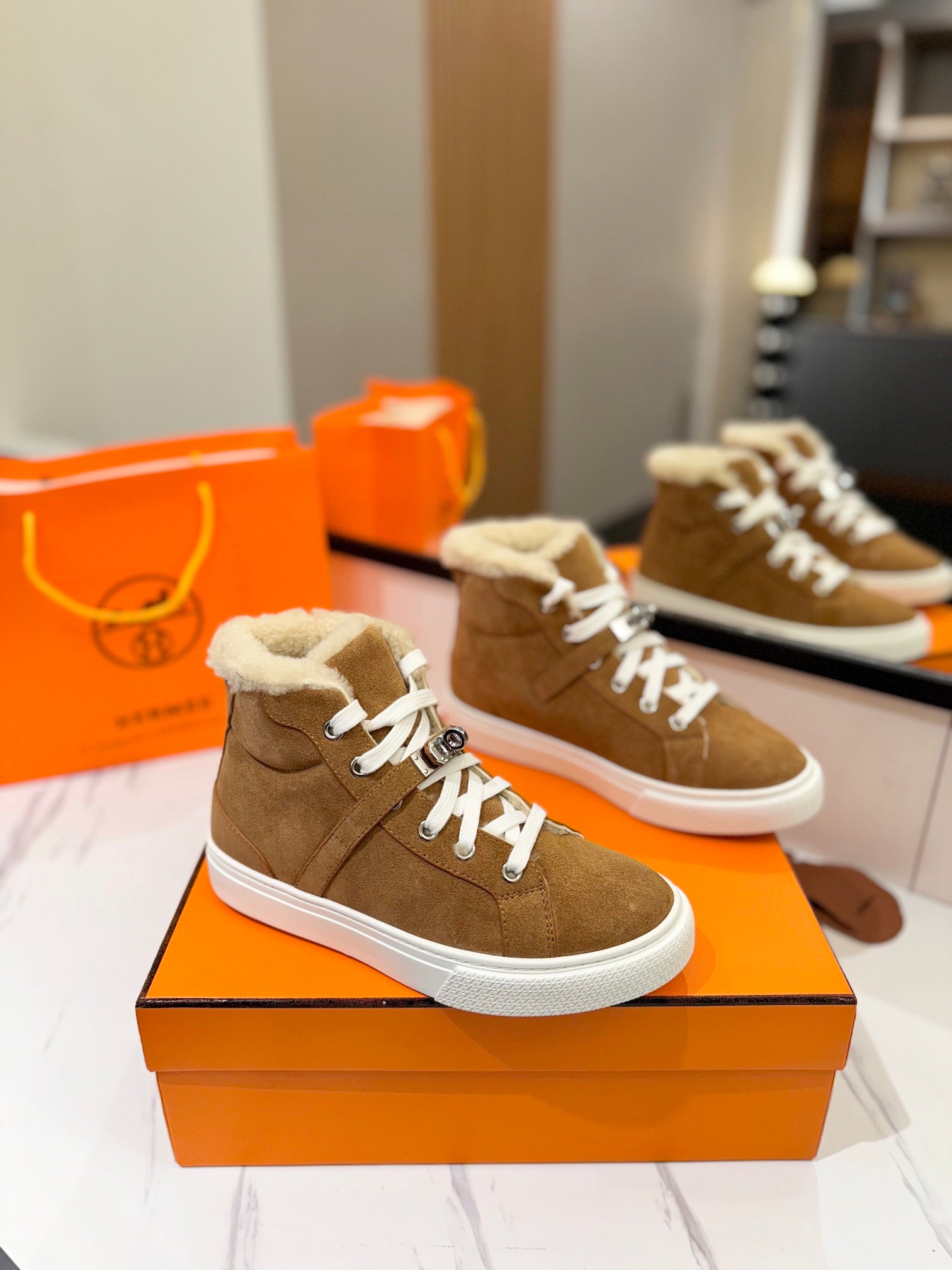 HERMES CHEALSEA BOOTS IN BRONZE BROWN SUEDE AND FLEECE LINING